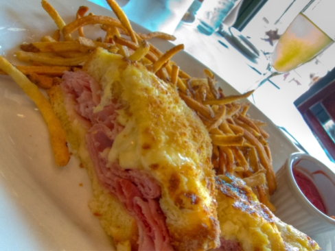 Croque Monsier=Ham and cheese sandwich with cheese melted on top (Madame also has an egg)